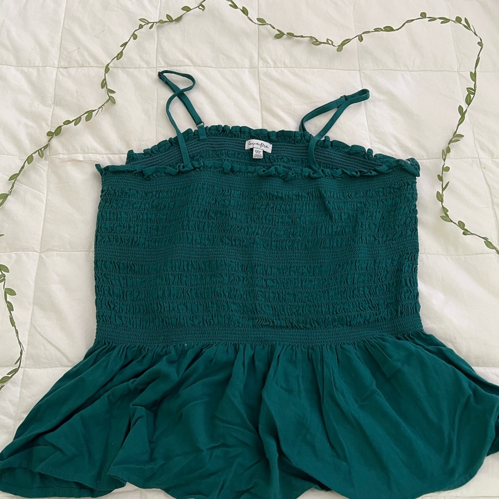 Green peplum tank top